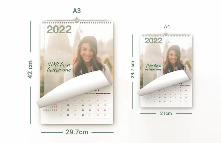 Hondenfoto's op op maat gemaakte fotokalender opgehangen aan de muur